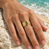 Starry Night ring on a hand beside the beach