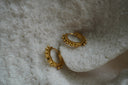 Alternate view: gold-tone flat-band hoop earrings edged with evenly spaced spherical dots.