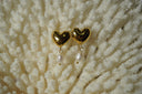 Alternate view: rounded gold-tone heart stud earrings with white oval bead drops.