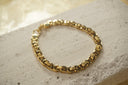Alternate view: gold-tone bracelet with closely interlocking rounded rectangular links and a clasp.