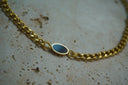 Alternate view: gold-tone chain necklace with a smooth dark horizontal oval centre in a narrow gold-tone border.