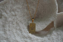 Alternate view: gold-tone necklace with a rectangular The Empress pendant, crown and circle-cross illustration, and III lettering.
