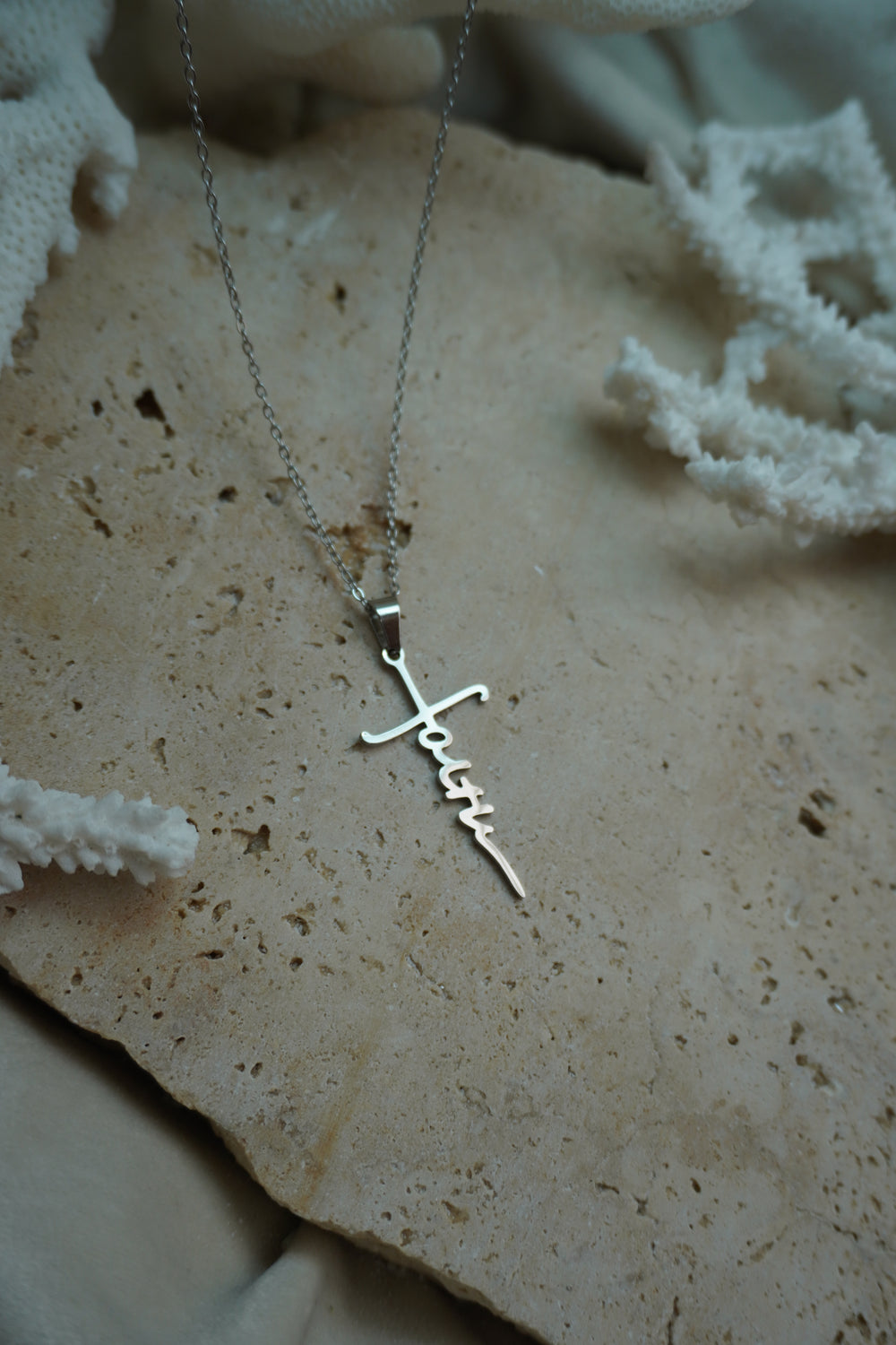 Alternate view: silver-tone fine chain necklace with a cut-out faith-script pendant incorporating a cross-like outline.