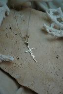 Alternate view: silver-tone fine chain necklace with a cut-out faith-script pendant incorporating a cross-like outline.