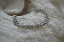 Alternate view: silver-tone chain bracelet edged with small spherical drops.