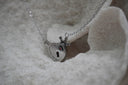 Alternate view: silver-tone necklace with a crowned heart, keyhole motif, red accent and LOVE lettering.