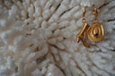 Gold-tone hoop earrings with separate western hat and boot charms.