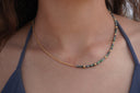 Worn view: necklace combining mottled green and grey beads with a gold-tone ball-chain section.