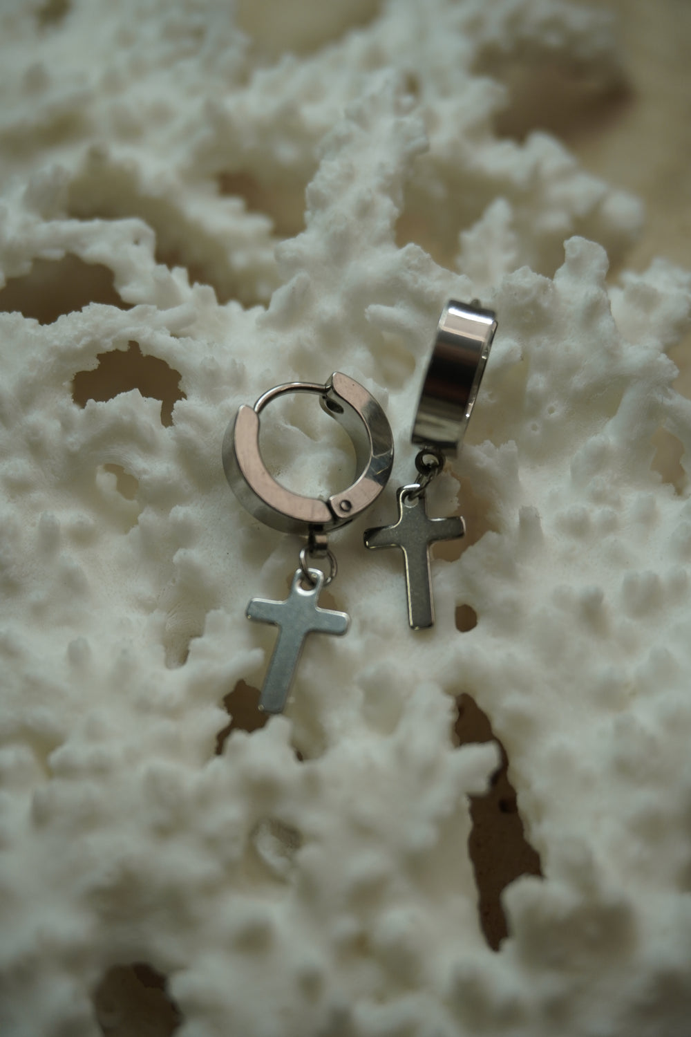 Alternate view: silver-tone broad hoop earrings with hanging plain cross charms.