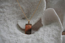 Gold-tone necklace with a rectangular The Tower pendant, cracked tower illustration and XVI lettering.