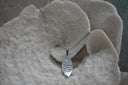 Alternate view: silver-tone chain necklace with a surfboard-shaped pendant bearing SURFING lettering.