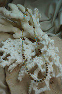 Alternate view: necklace with brown and pale green faceted beads, small blue accents and gold-tone spacers.
