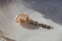 Alternate view: long drop earrings with round gold-tone studs, fine chains and green, grey and purple-toned beads.