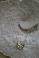 Alternate view: necklace with an iridescent striped half-circle centre, ridged gold-tone border and fine chain.