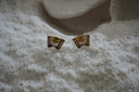 Alternate view: gold-tone accordion-shaped stud earrings with bellows, button dots and keyboard details.