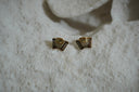 Gold-tone accordion-shaped stud earrings with bellows, button dots and keyboard details.