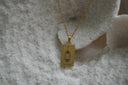 Alternate view: gold-tone necklace with a rectangular The Hermit pendant, lantern illustration and IX lettering.